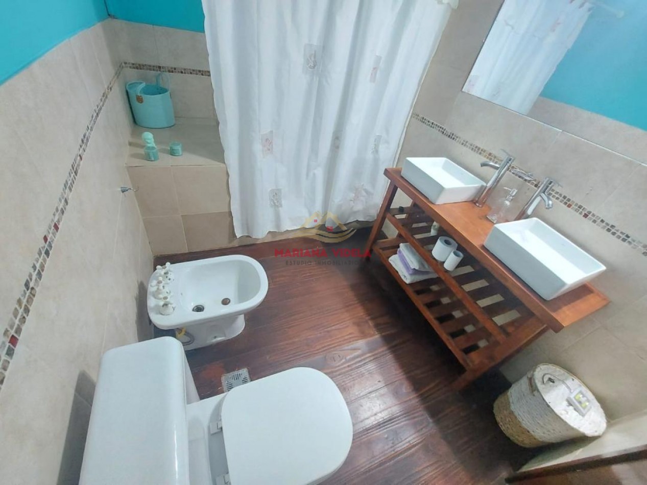 Casa en venta en Carilo, tipo cabaña.